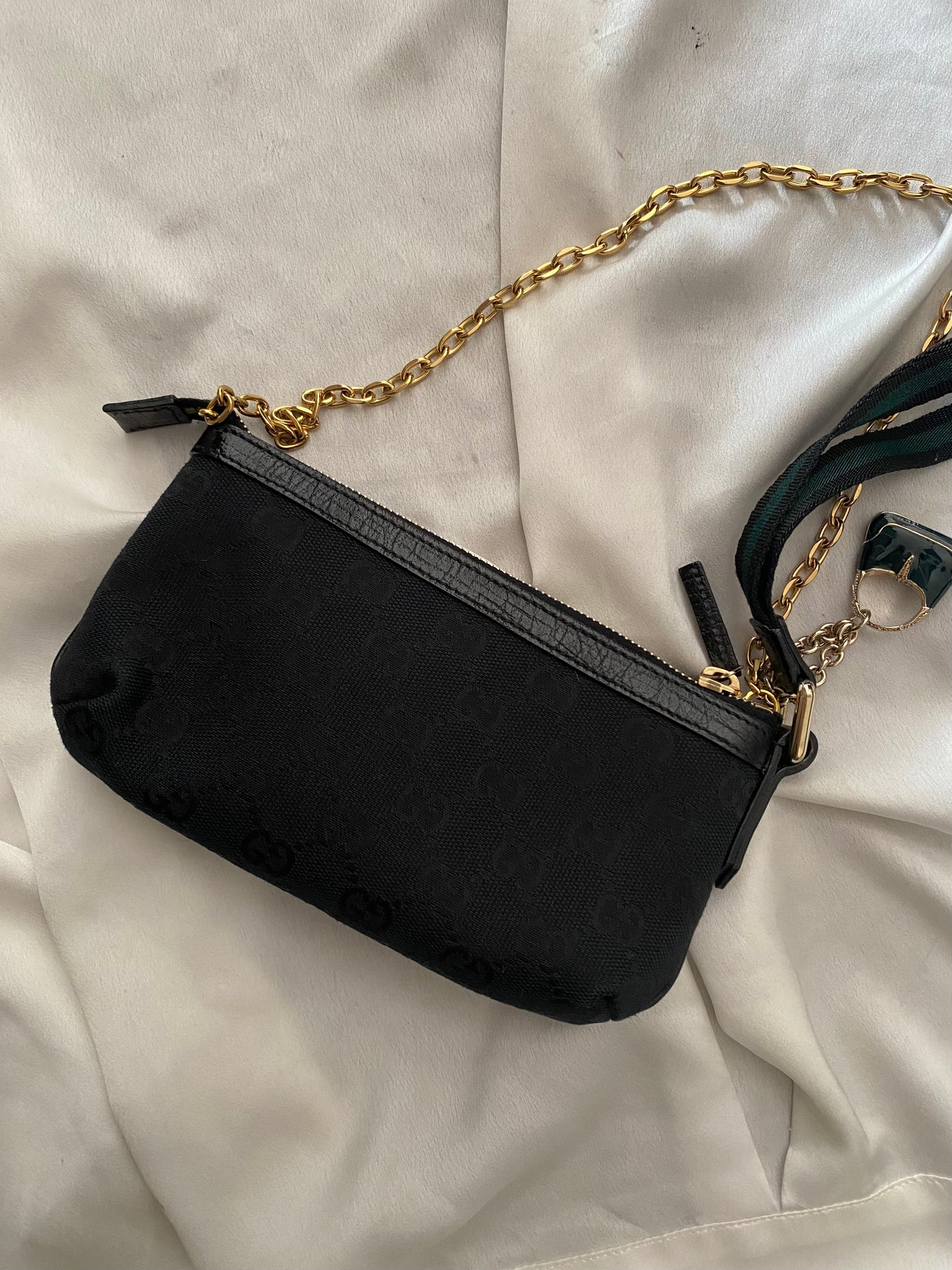 Gucci black monogram web clutch