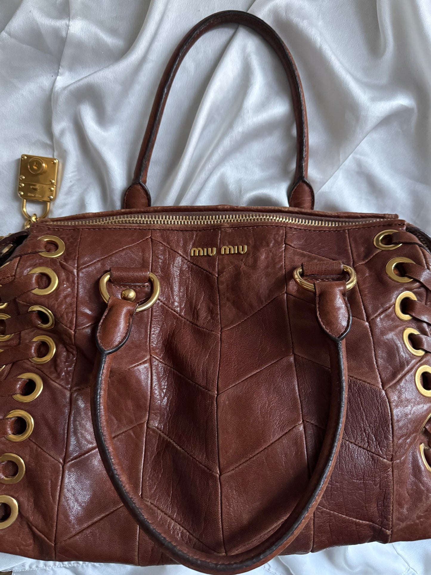 Miu miu grommet misura media