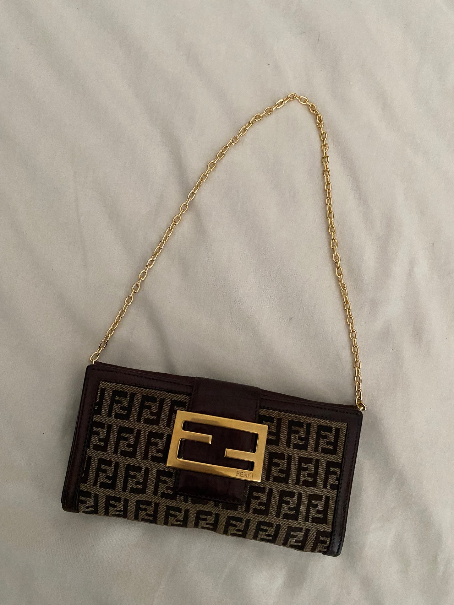 Fendi zucchini clutch bag with maxi logo