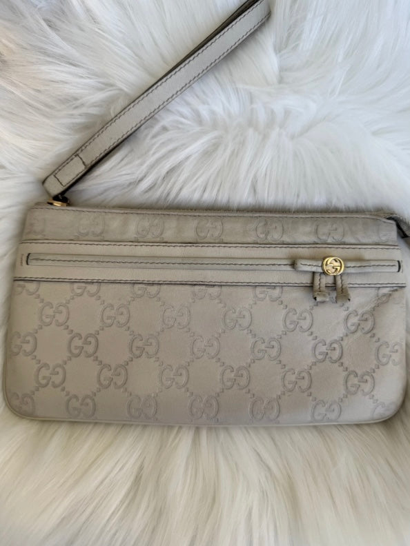 Gucci monogram cream leather clutch bag