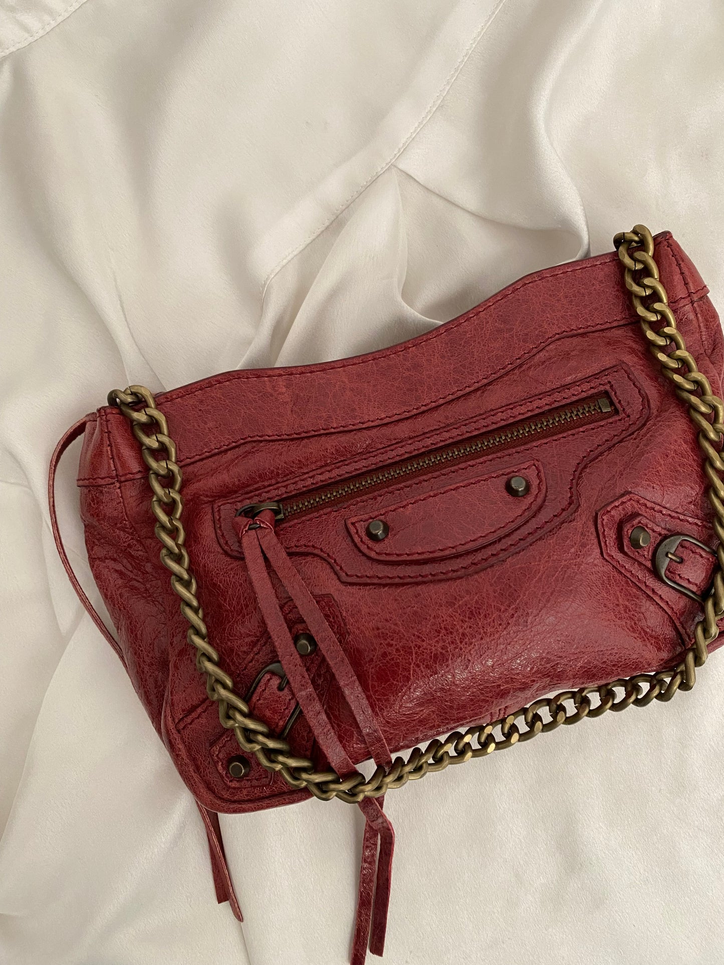 Balenciaga motocross burgundy clutch bag