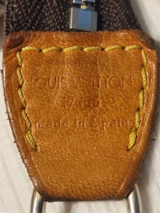 Louis Vuitton clutch accessoire perforated green