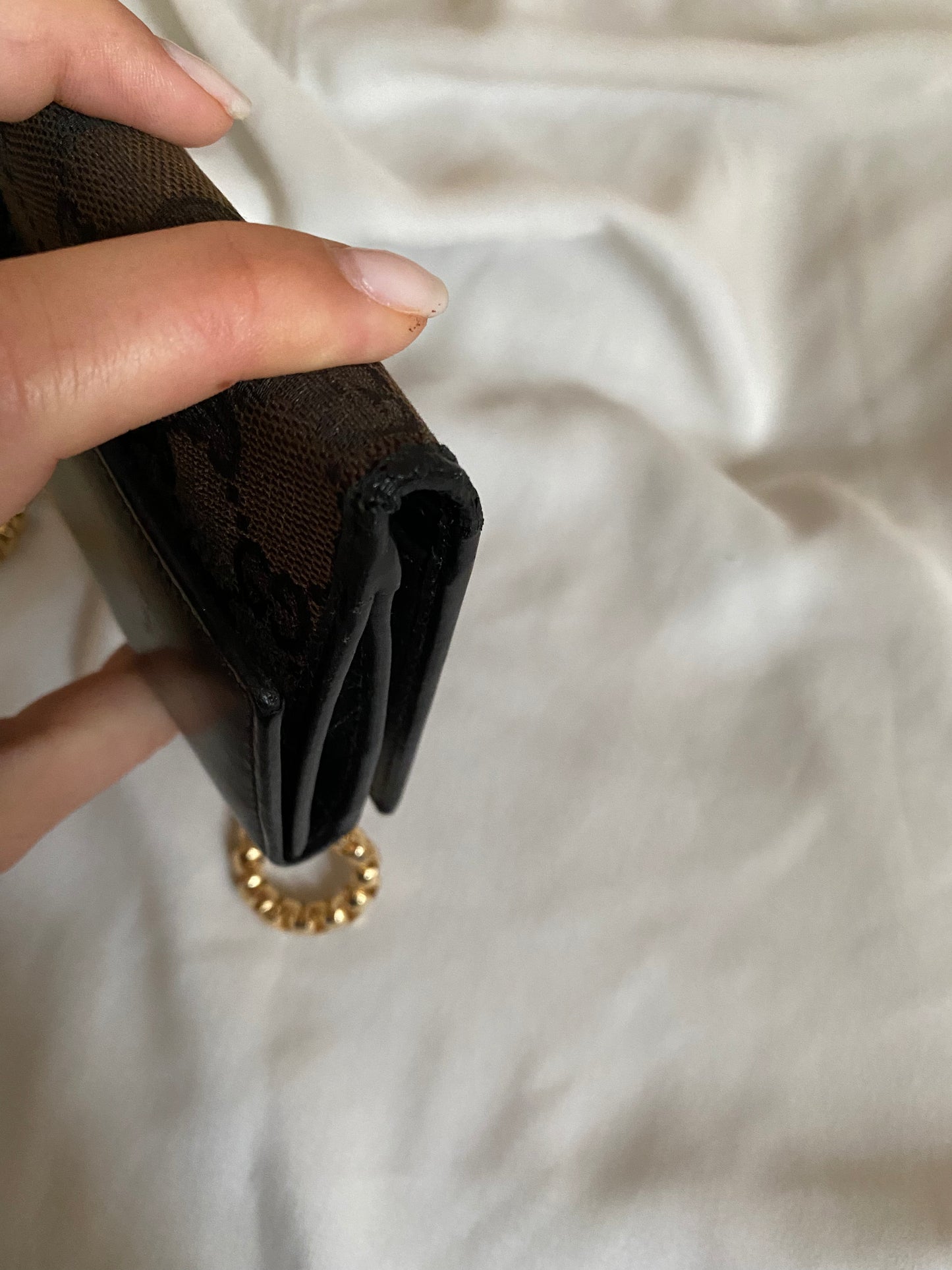 Gucci Monogram brown clutch bag