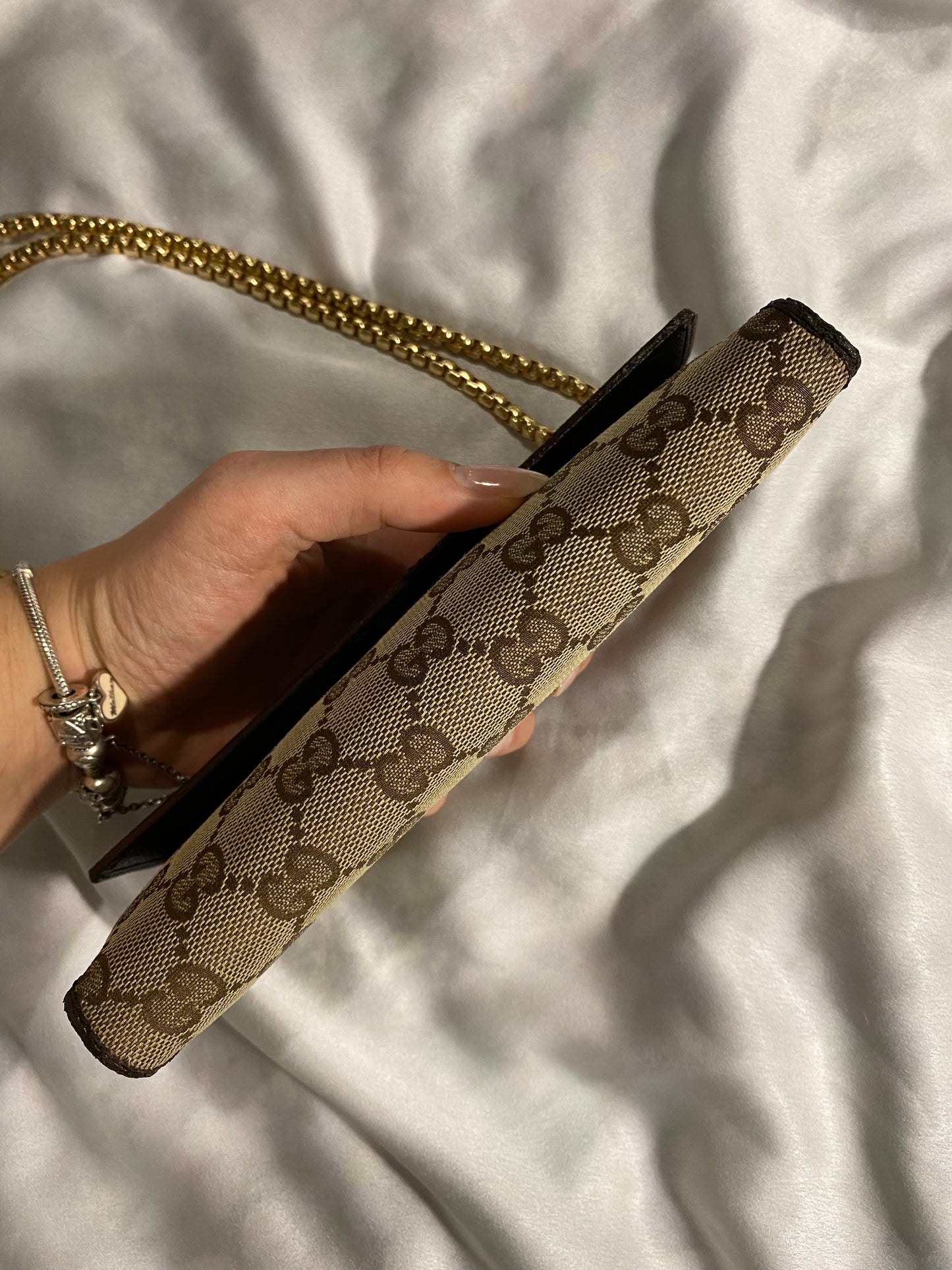 Gucci classic monogram clutch bag