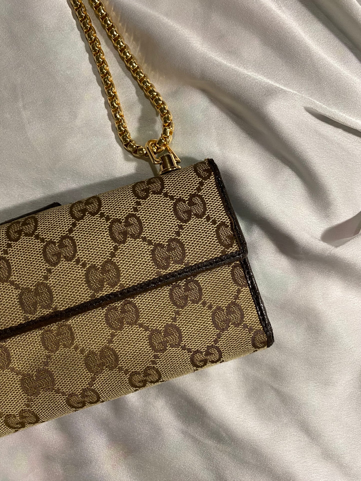 Gucci classic monogram clutch bag