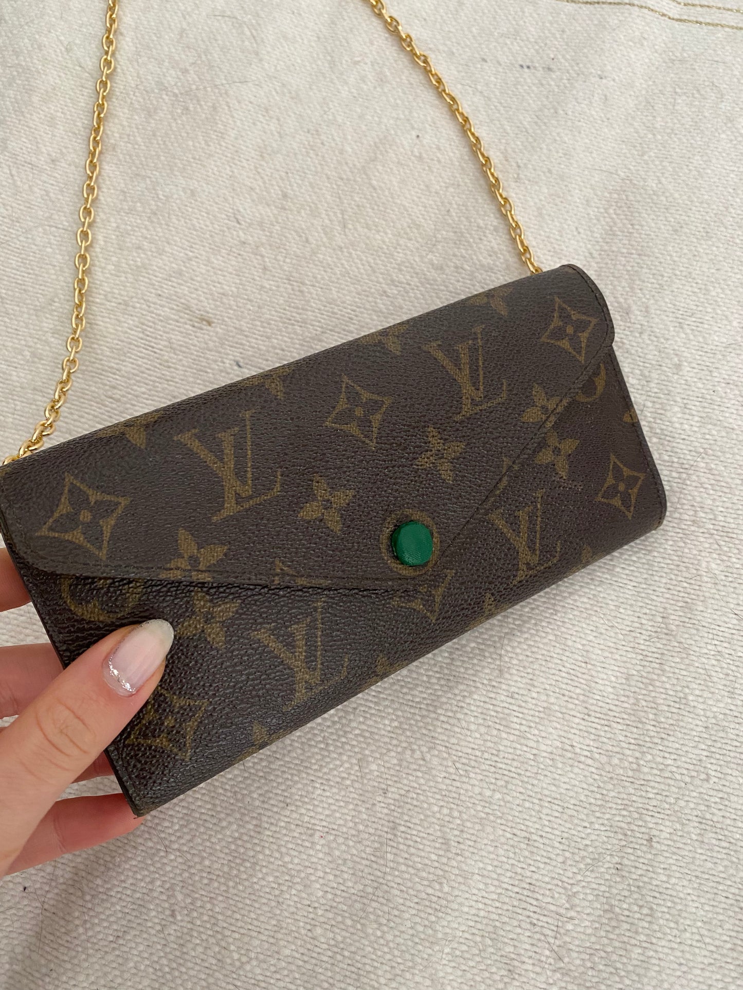 Louis Vuitton classic monogram clutch bag inside green