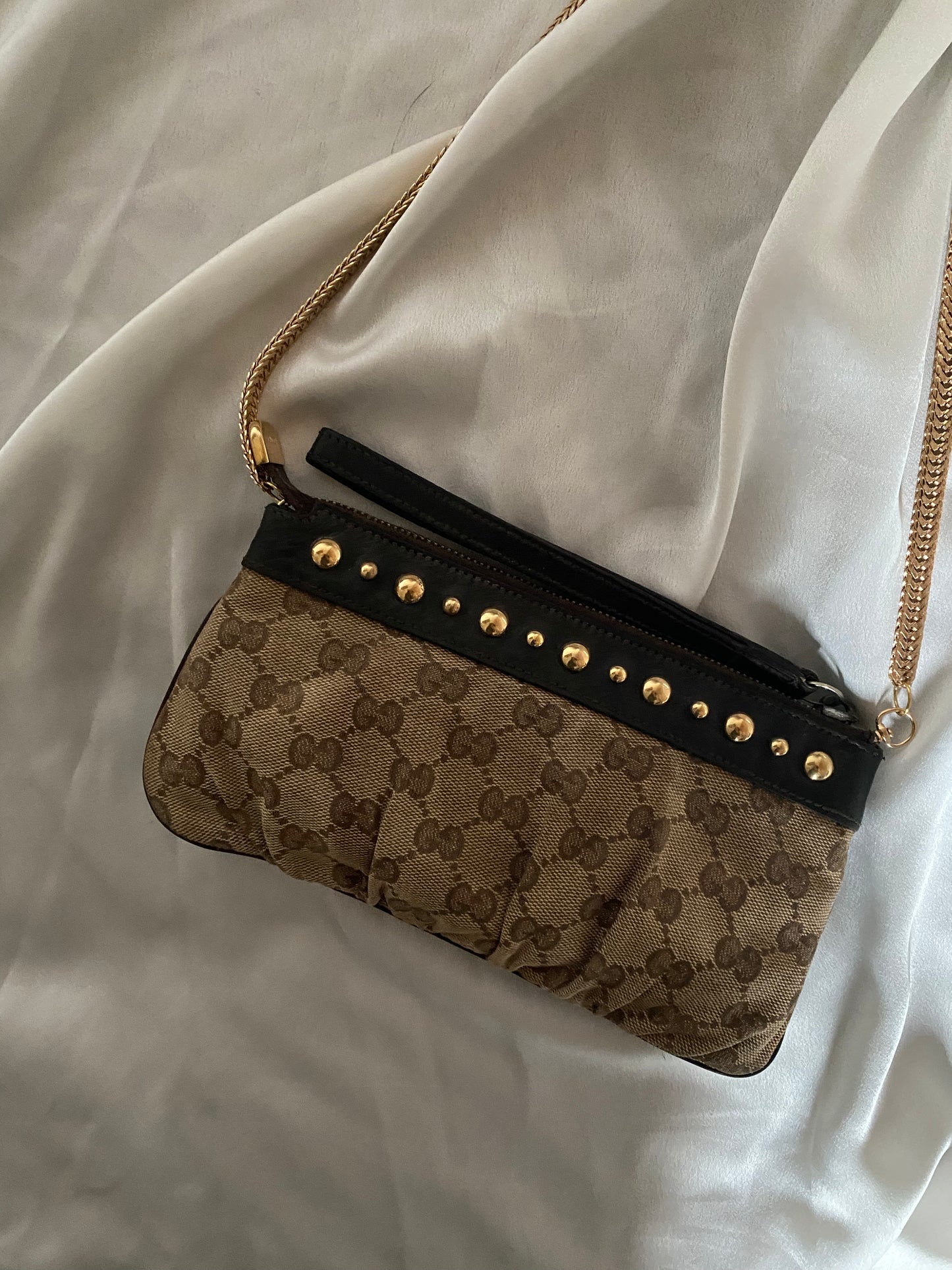 Gucci classic monogram clutch bag