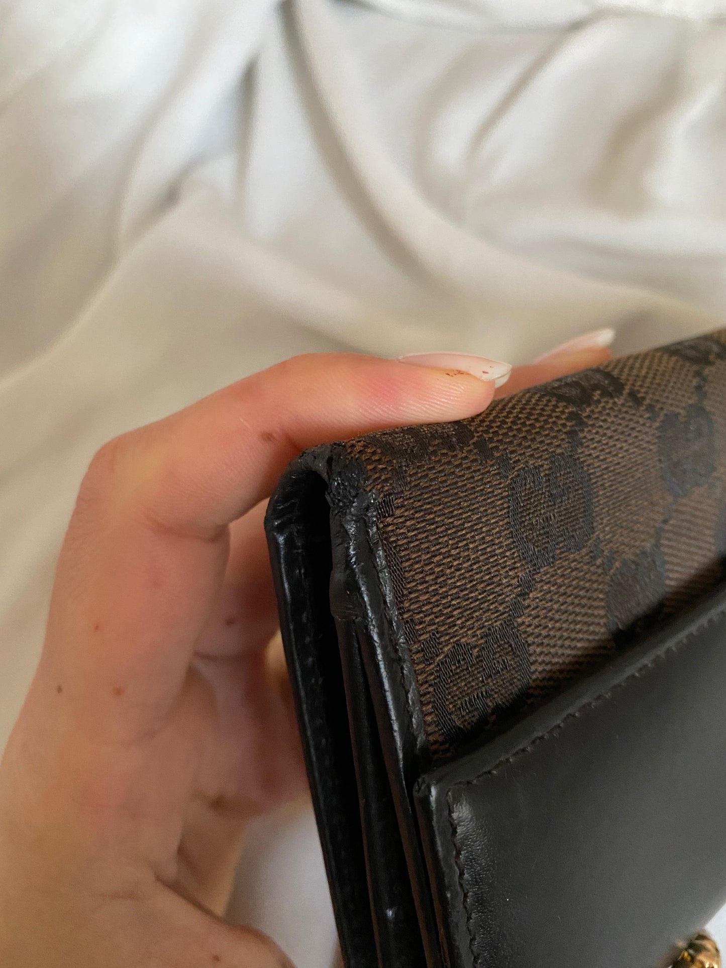 Gucci Monogram brown clutch bag