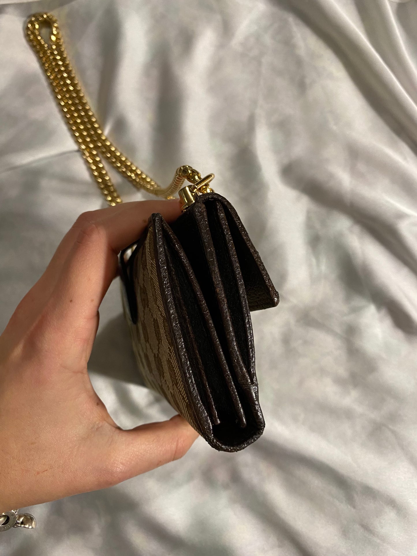 Gucci classic monogram clutch bag