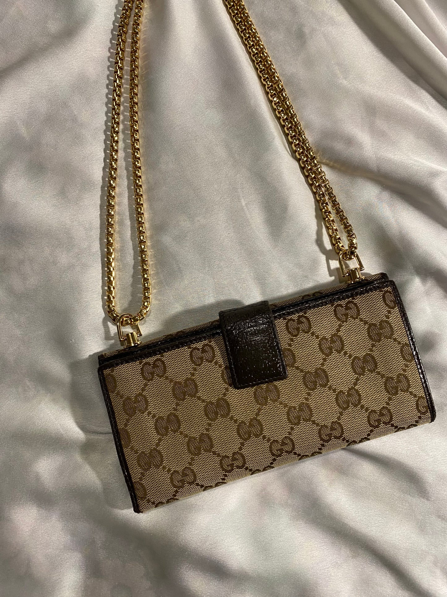 Gucci classic monogram clutch bag