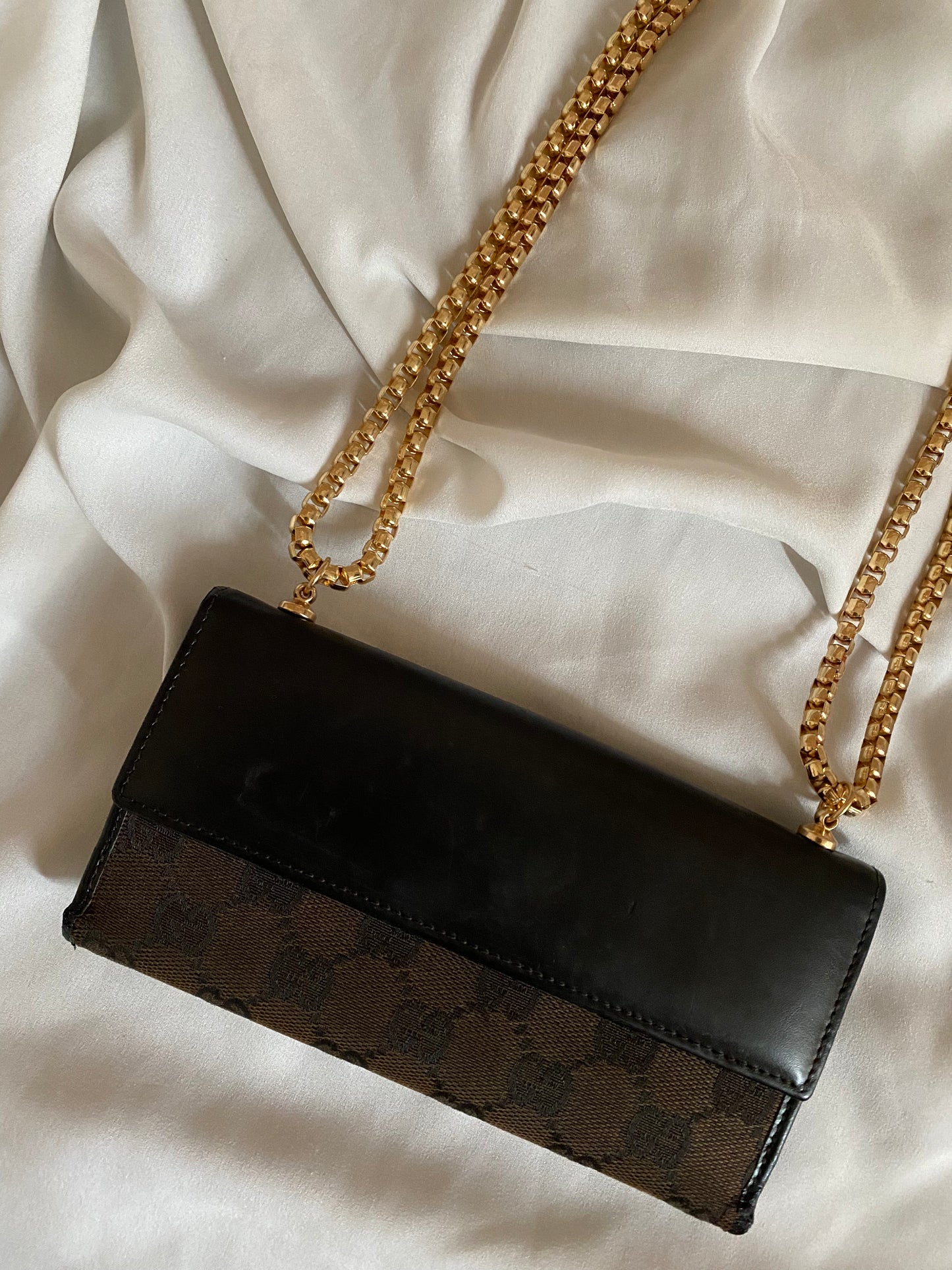 Gucci Monogram brown clutch bag