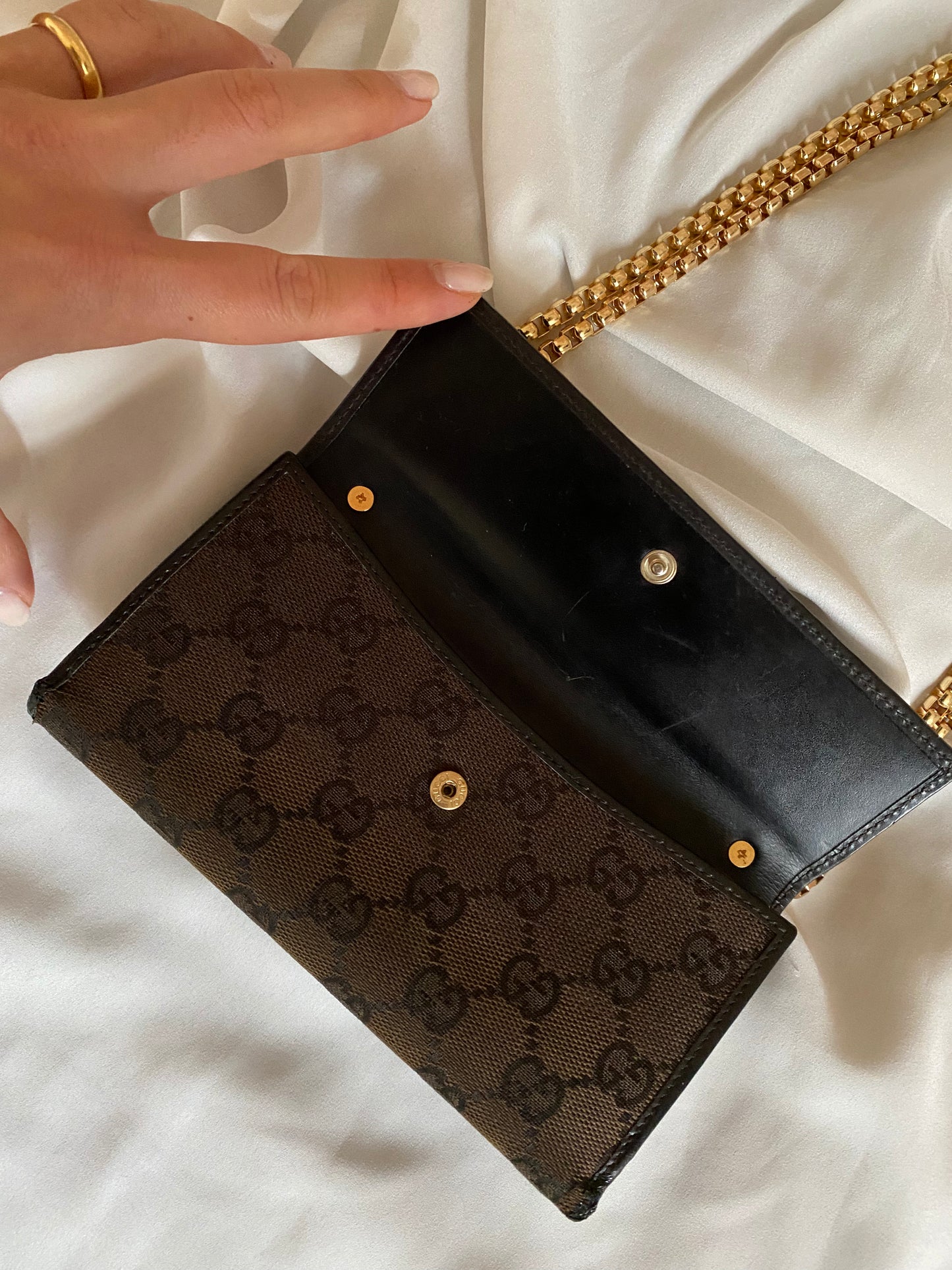Gucci Monogram brown clutch bag