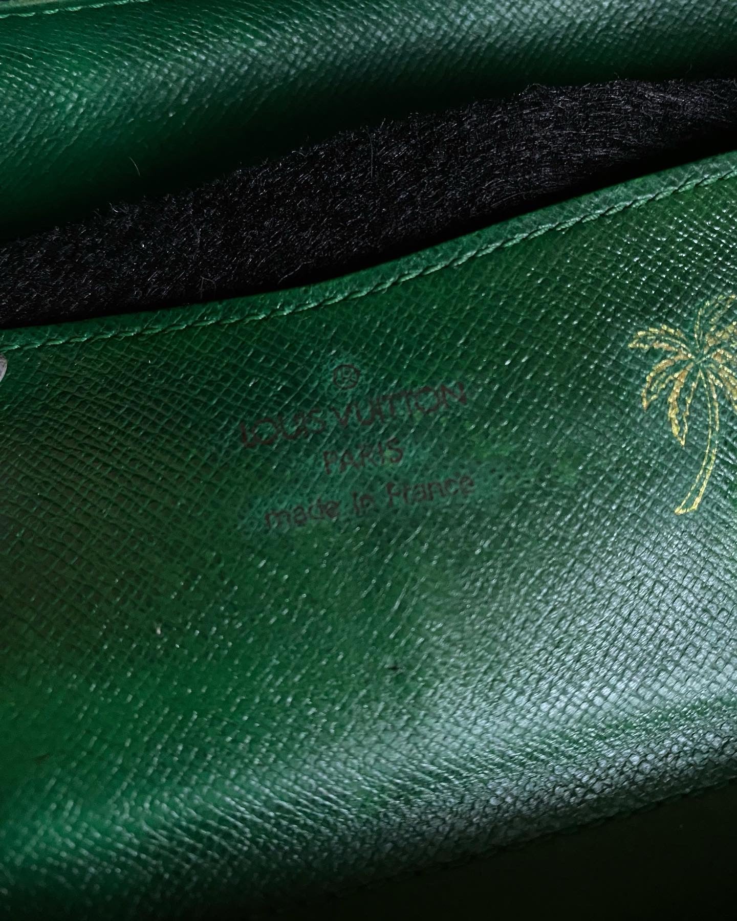 Louis Vuitton classic monogram clutch bag inside green