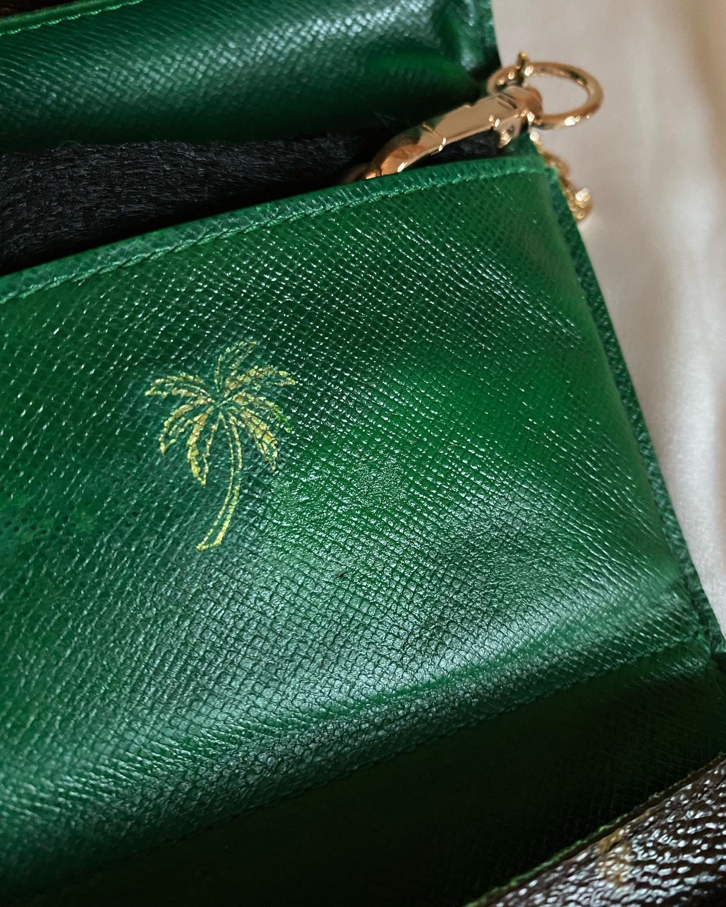Louis Vuitton classic monogram clutch bag inside green