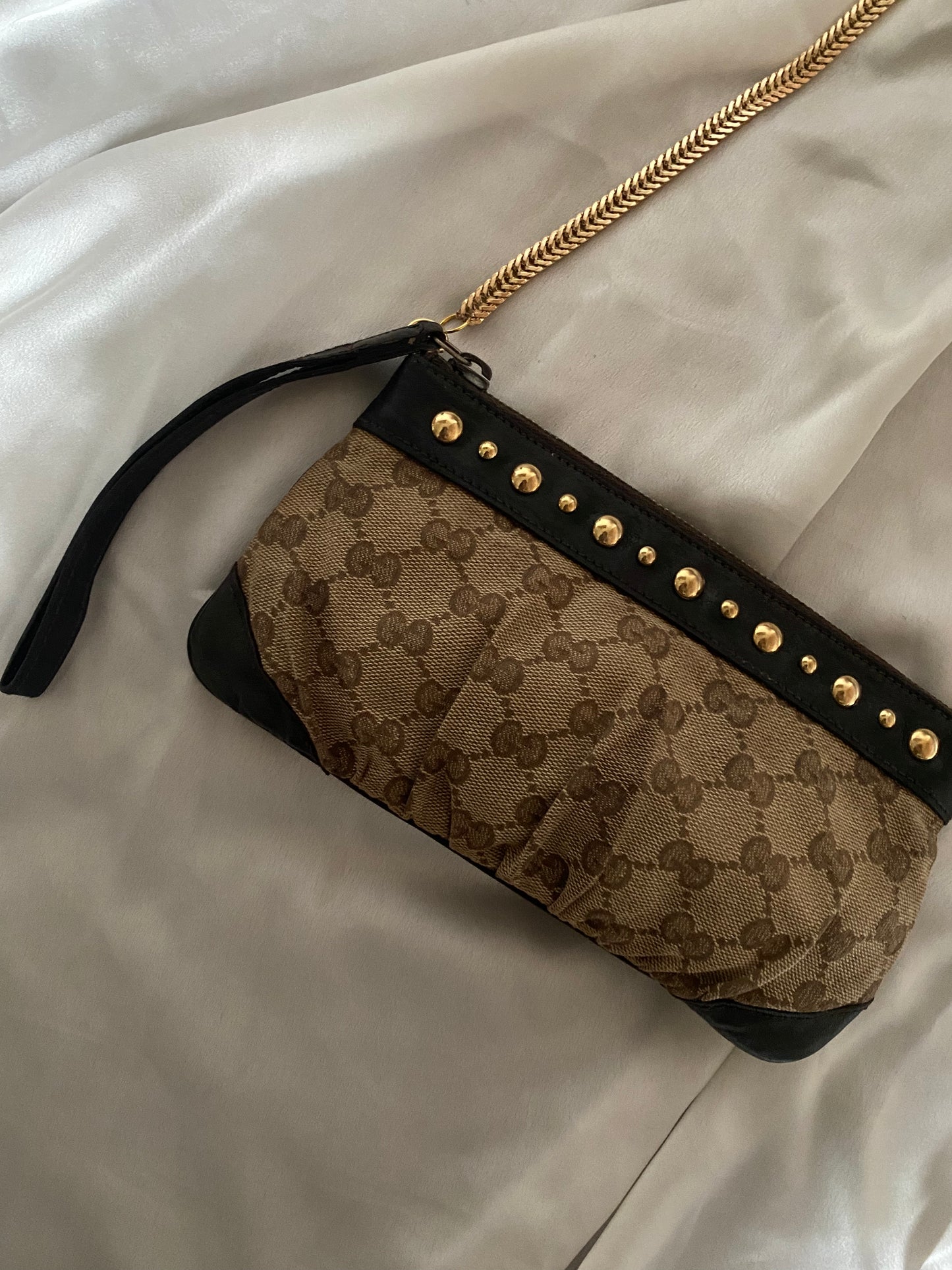 Gucci classic monogram clutch bag