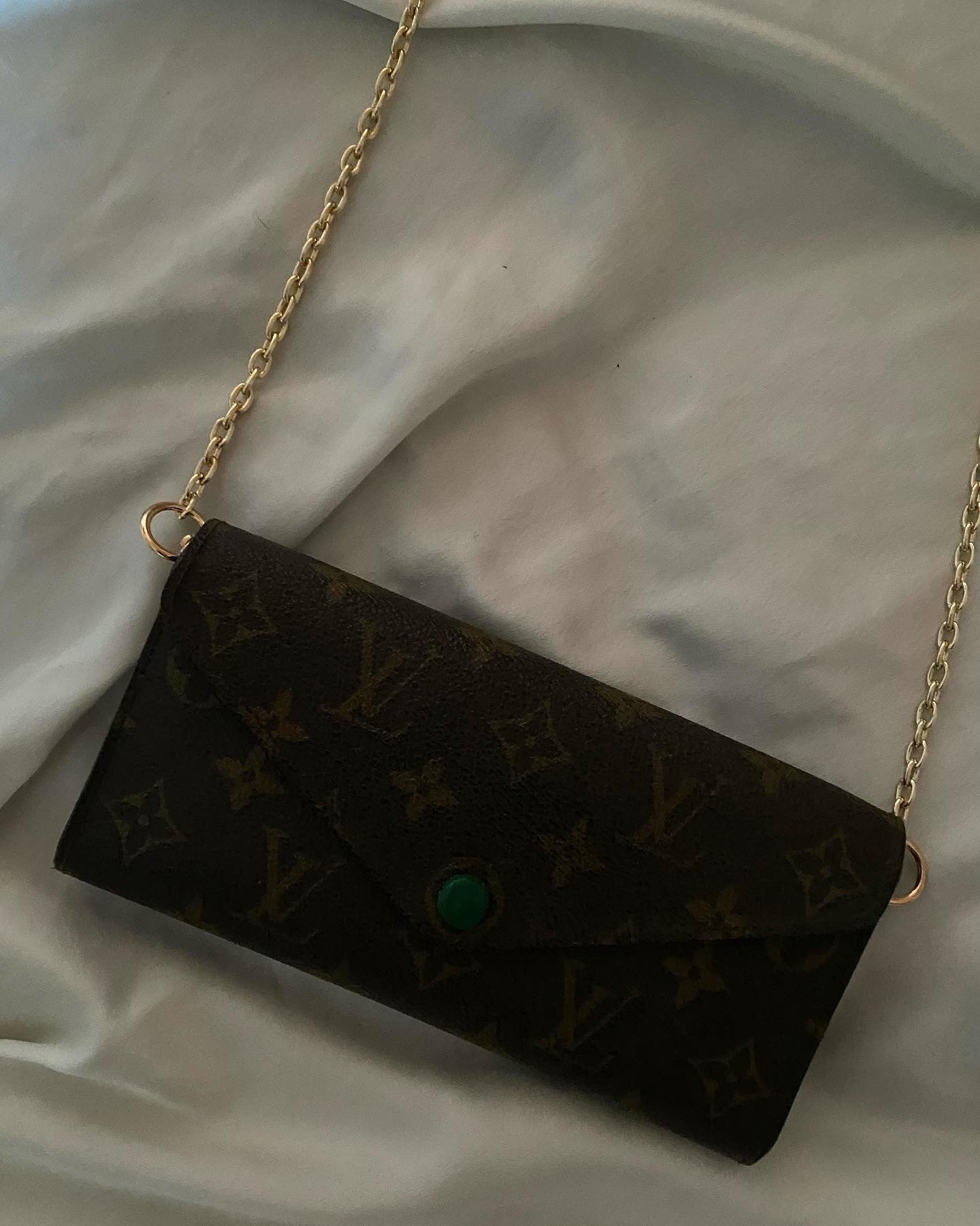 Louis Vuitton classic monogram clutch bag inside green