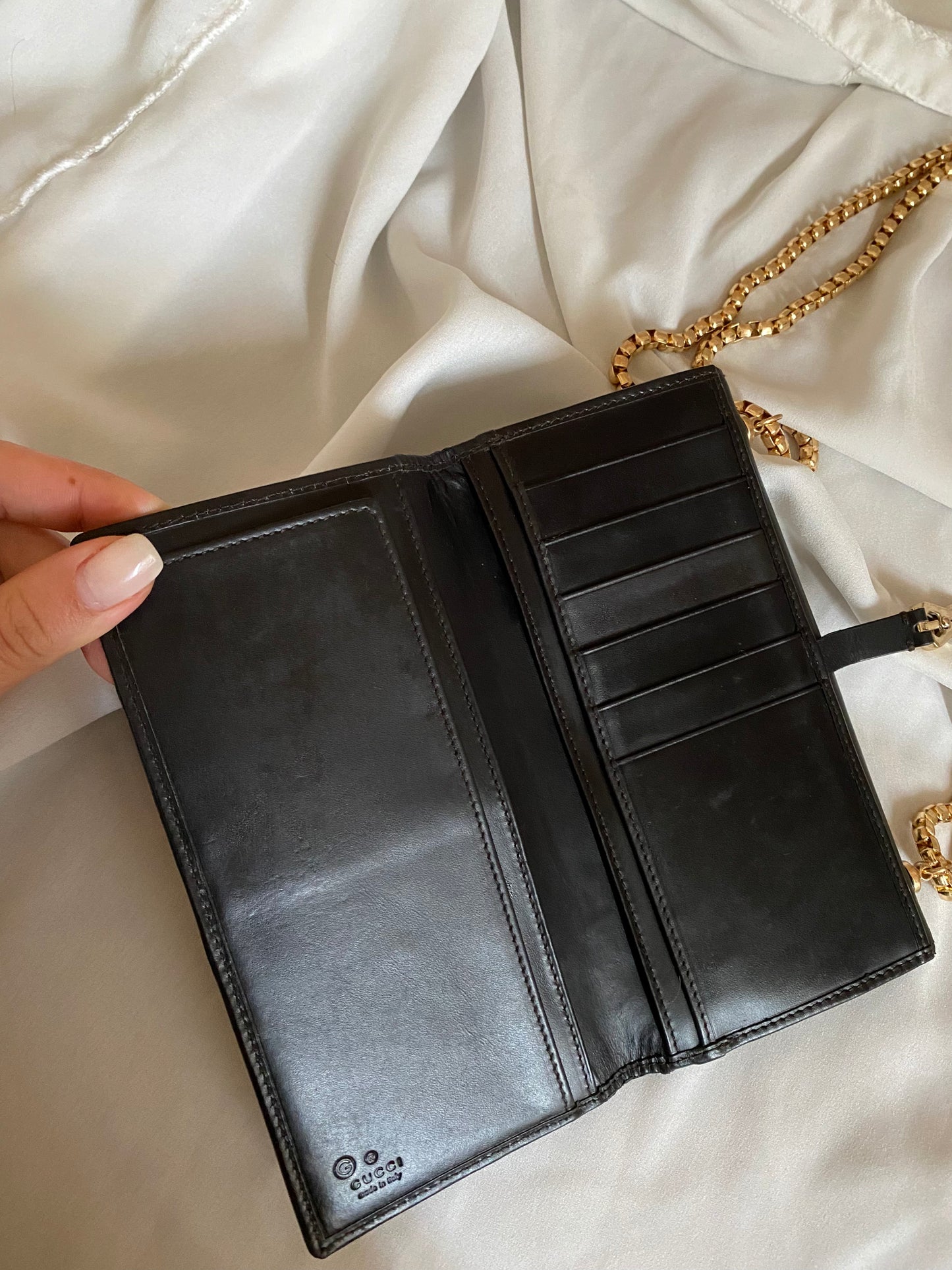 Gucci Monogram brown clutch bag