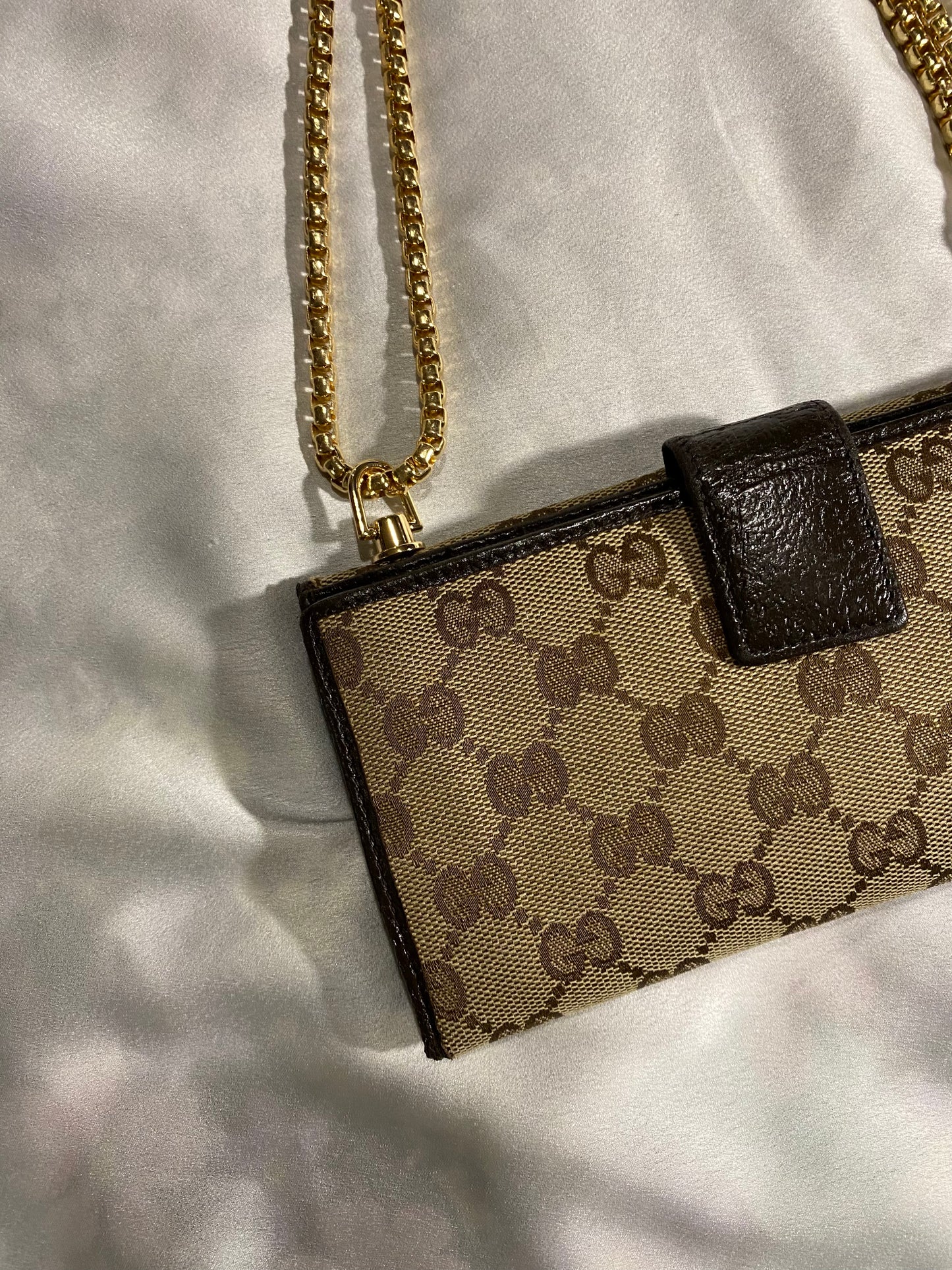 Gucci classic monogram clutch bag